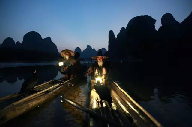 漓江老渔翁老照片,桂林山水渔翁与鸬鹚夜景高清图片
