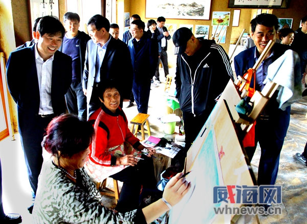 渔民成画家渔村变画村