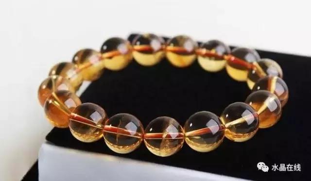 黄水晶千手观音吊坠真假,纯净体黄水晶怎么辨别真假