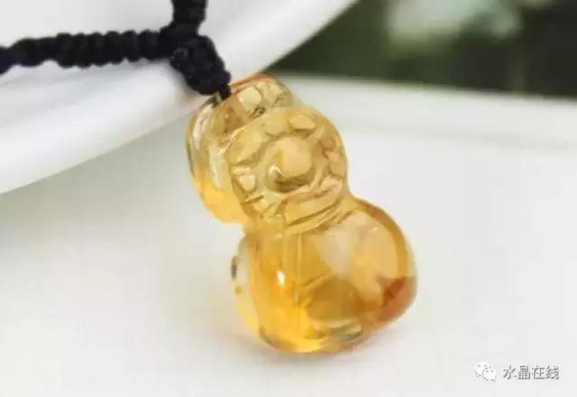 黄水晶珠子的鉴别真假图片,怎样鉴别黄水晶吊坠的真假