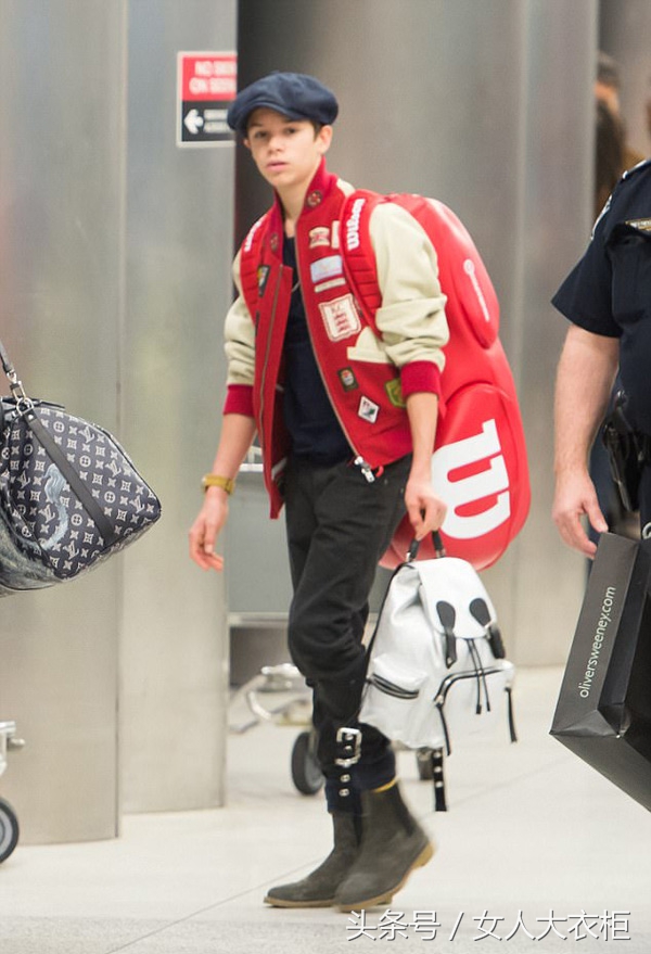 贝克汉姆和维多利亚出街,机场保安护送明星