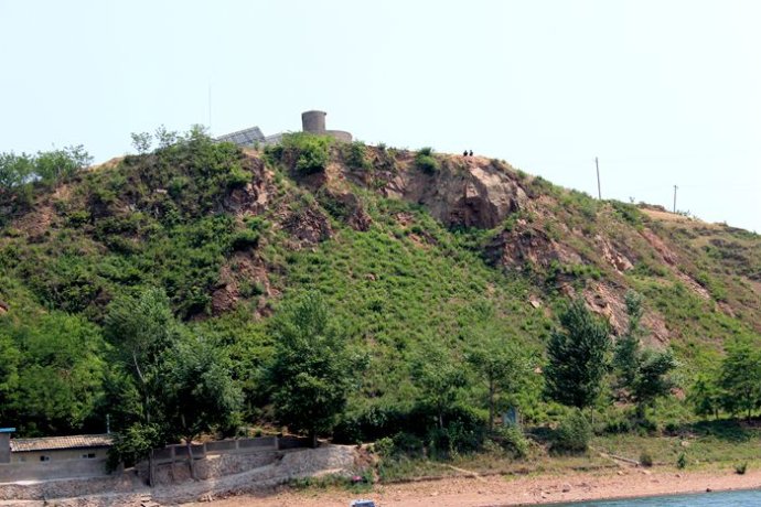 中朝边境美丽的风景,中朝边境桃花盛开的地方
