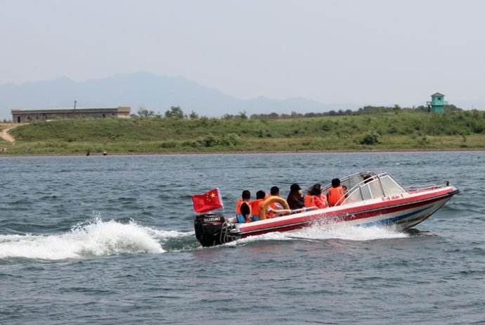 中朝边境美丽的风景,中朝边境桃花盛开的地方