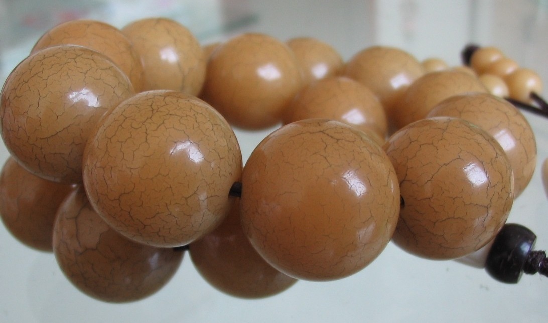 星月菩提子雕刻作品,菩提子手把件雕刻图片大全