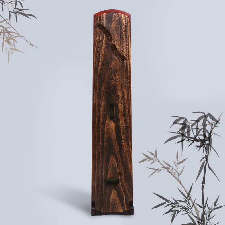 整挖古筝和手工古筝区别在哪里,整挖古筝