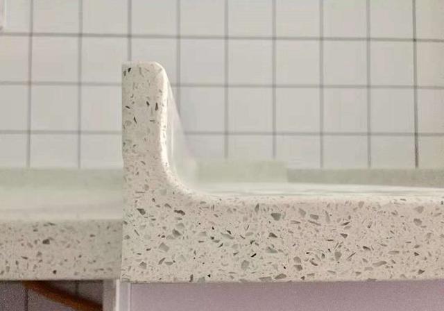 橱柜台面人造石好还是不锈钢好,橱柜用人造大理石台面还是石英石