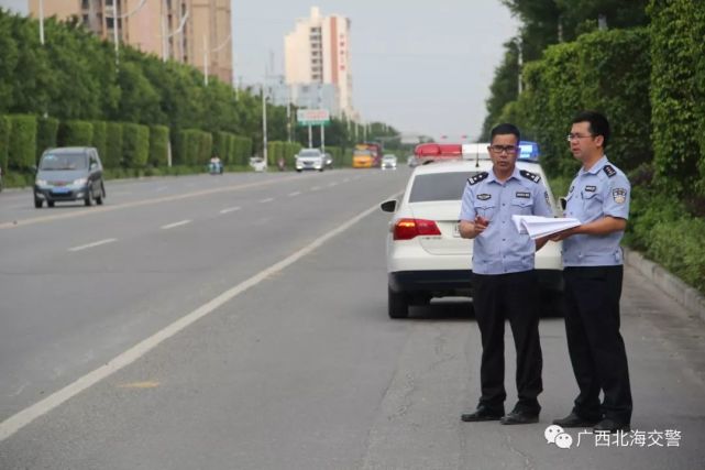 喜报公安局民警荣获劳动模范称号,广西北海交警郑明