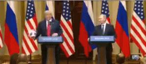 普京与特朗普碰杯,特朗普普京会面送足球视频