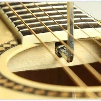 琴弦过高去琴行调节,琴弦过高怎么调