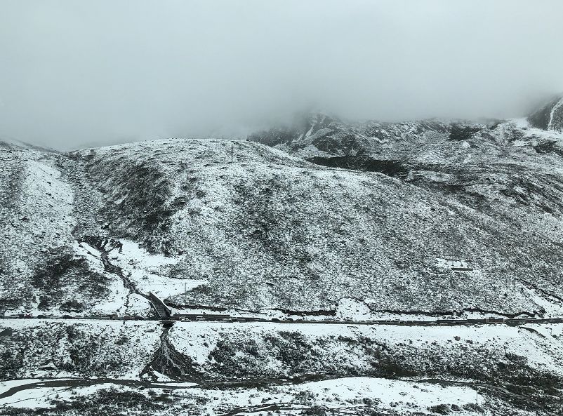 去稻城有没有不翻折多山的路,去稻城先过康定还是折多山