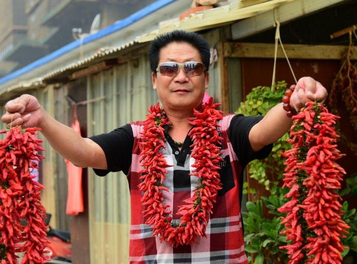 中国辣王李永志吃碎辣椒配白酒,中国辣王李永志讲哪里最能吃辣椒