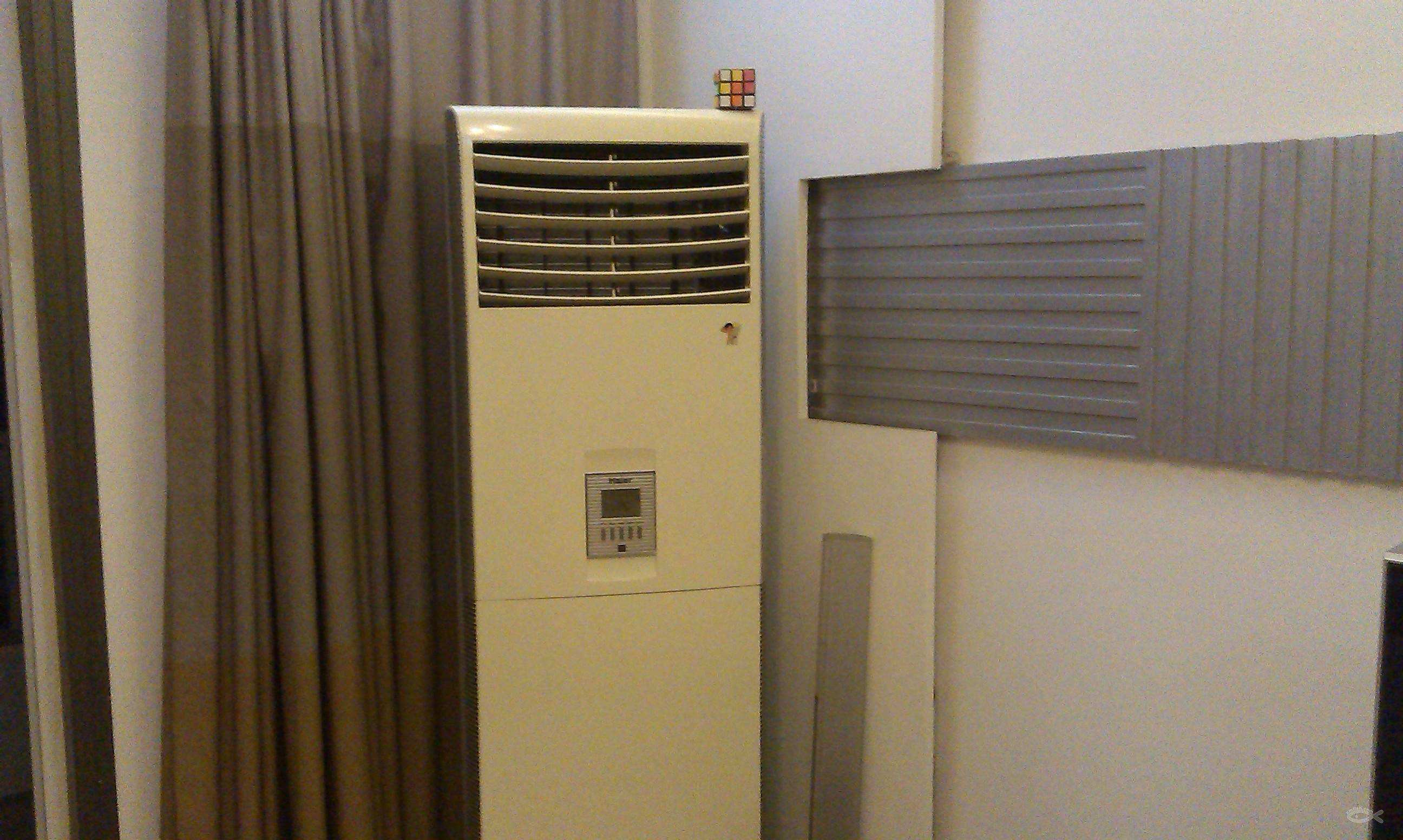 柜机空调圆柱形和方形哪个好看,柜机空调是方形的好还是圆形的好