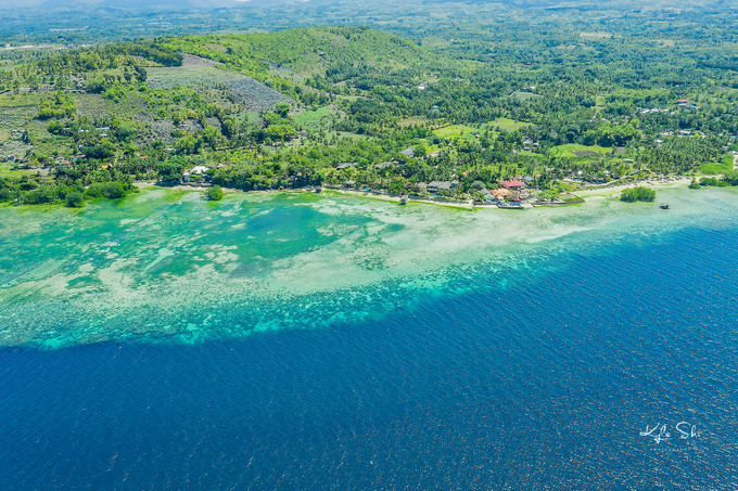 在海洋上与世隔绝的小岛,到大海里面就找一个小岛去生活