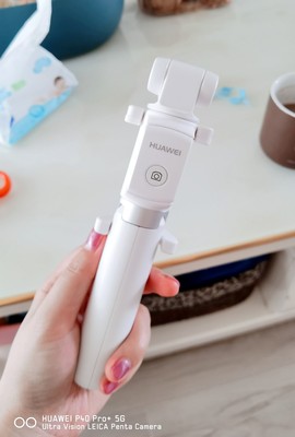 华为三脚架自拍杆af15怎么用,华为有线自拍杆的使用方法及操作