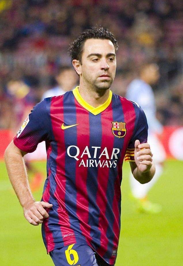 没有赛事的日子翻翻相册,哈维接近生涯第四冠