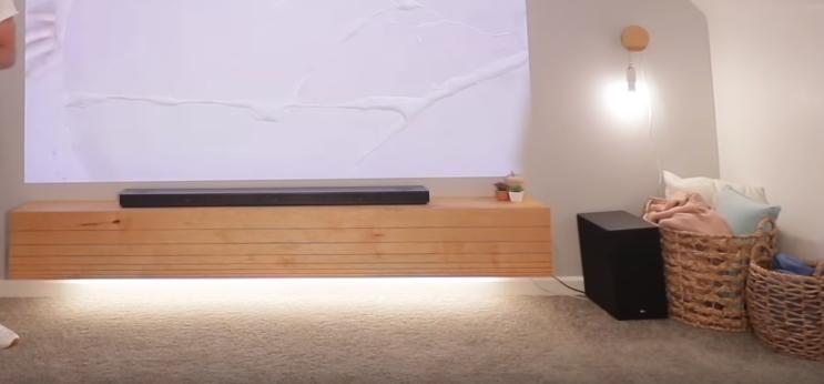 电视柜加隐形柜门一体效果图,悬空电视柜中间不做柜门好看吗