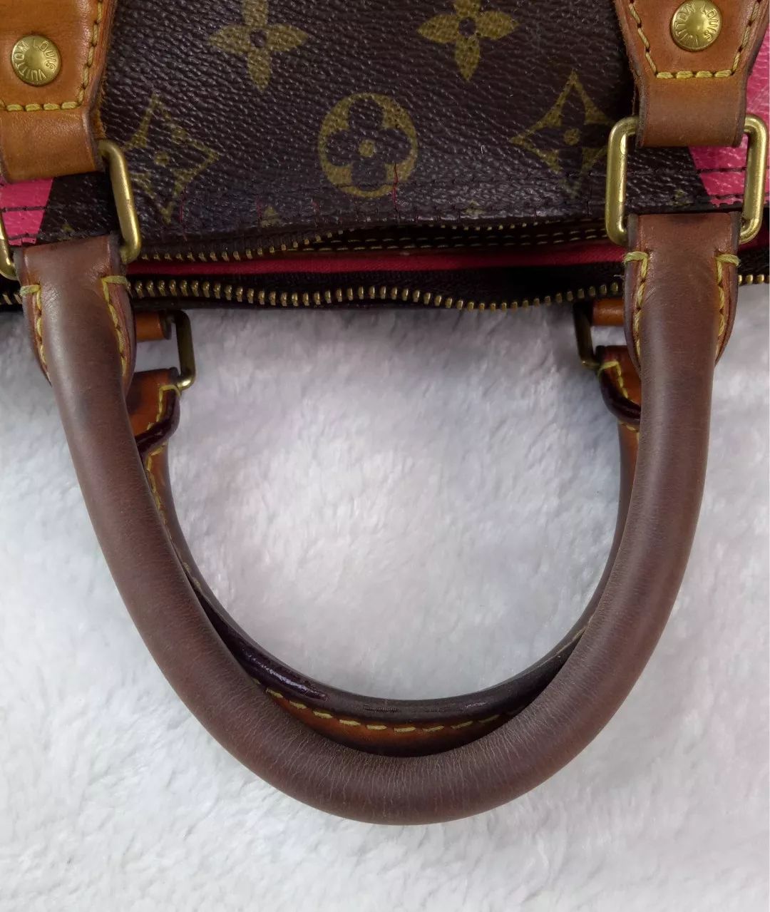 lv老花手柄脏了怎么办,lv手柄有瑕疵正常吗