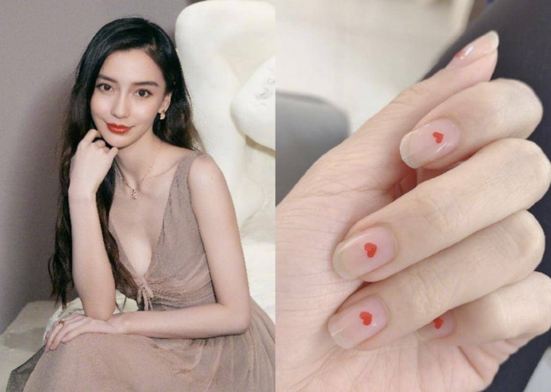 今年最流行新年的美甲,新年装扮女明星