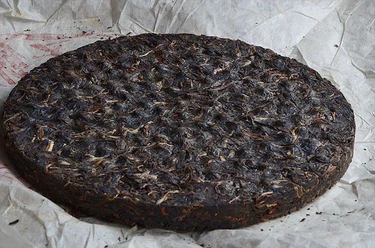 七子饼茶的历史背景,中茶牌七子茶饼铁饼