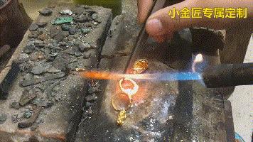 黄金火烧后变黑是什么原因,用火烧黄金变黑是假黄金吗