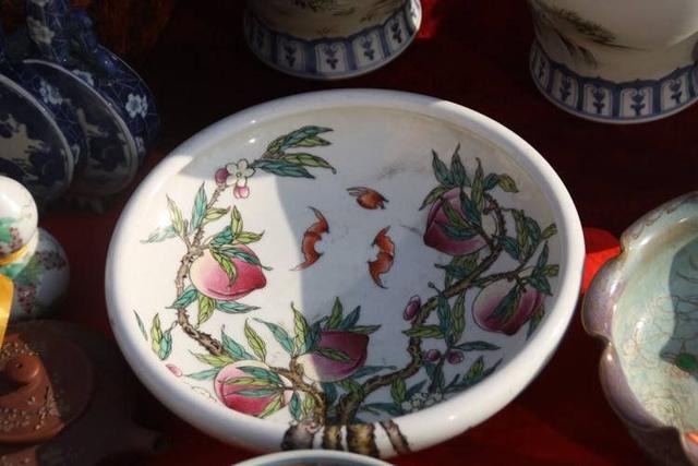 古玩市场买到假货怎么办,古玩市场到底有没有宝