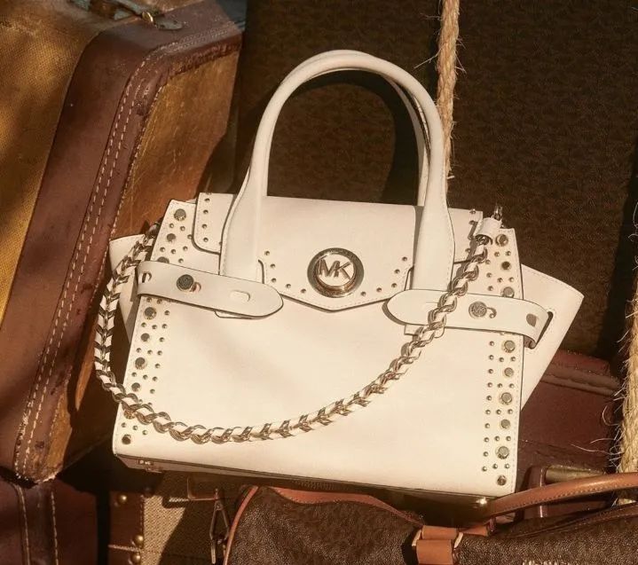 和蔻驰mcm差不多档次的包包牌子,各大品牌包包轻奢蔻驰