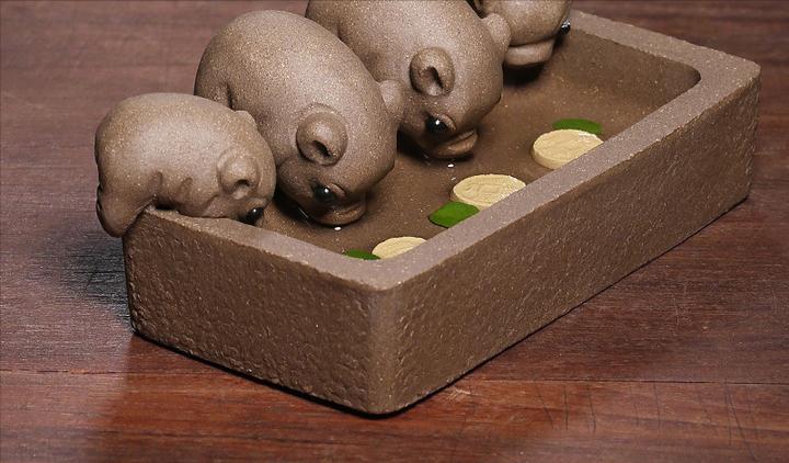 两只小船茶宠寓意什么,茶宠猪的寓意和象征