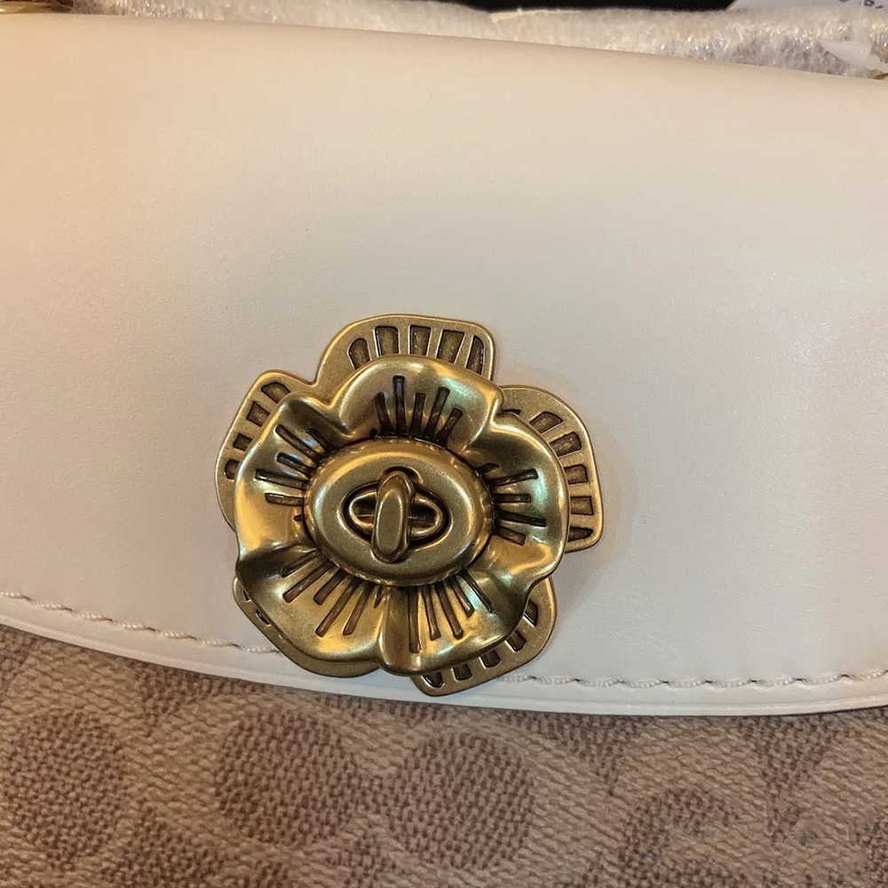 大家会买蔻驰几年前的包吗,几百块钱能买到蔻驰真包吗