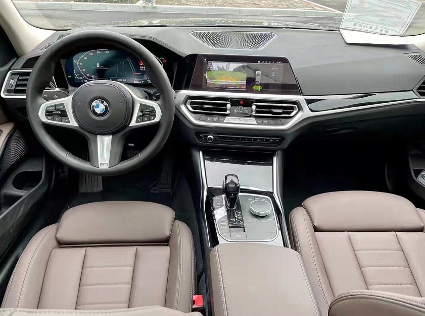 宝马3系和5系哪个更值得买,宝马3系曜夜版好还是5系好