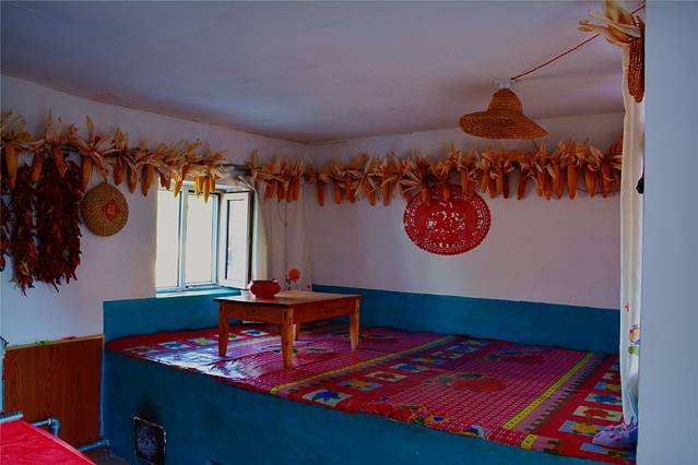 东北人为什么喜欢睡“火炕”，这种习俗源于何时？有何历史渊源？