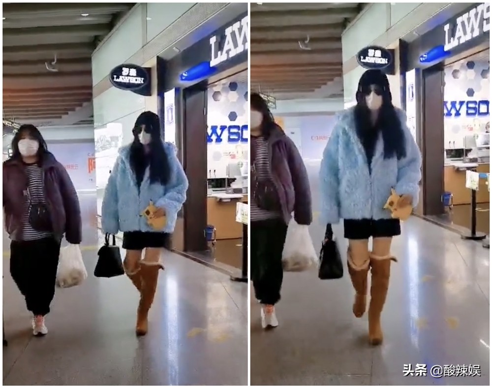 范冰冰现身机场穿牛仔裤,范冰冰穿羽绒服机场秀