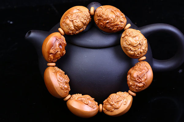 橄榄手串盘花,橄榄核雕手串盘花了怎么办视频