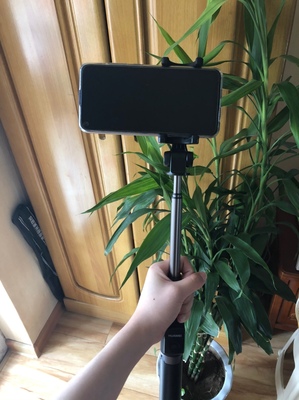 华为三脚架自拍杆af15怎么用,华为有线自拍杆的使用方法及操作