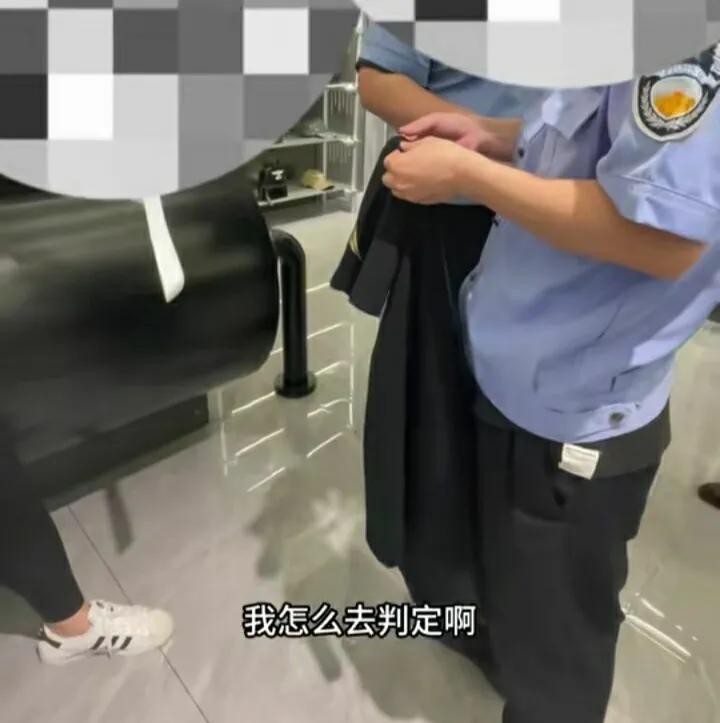 试衣服不慎掉地上被索赔后续,男子试衣服不慎掉到地上