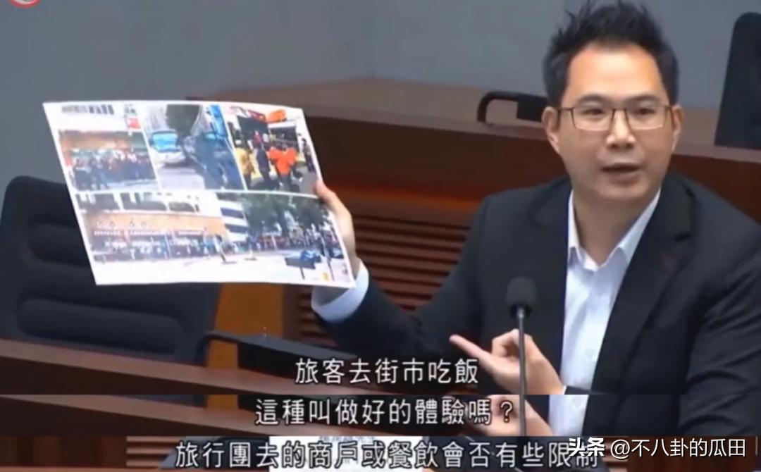 内地游客在香港街头吃饭,内地游客在香港吃饭蹲在地上