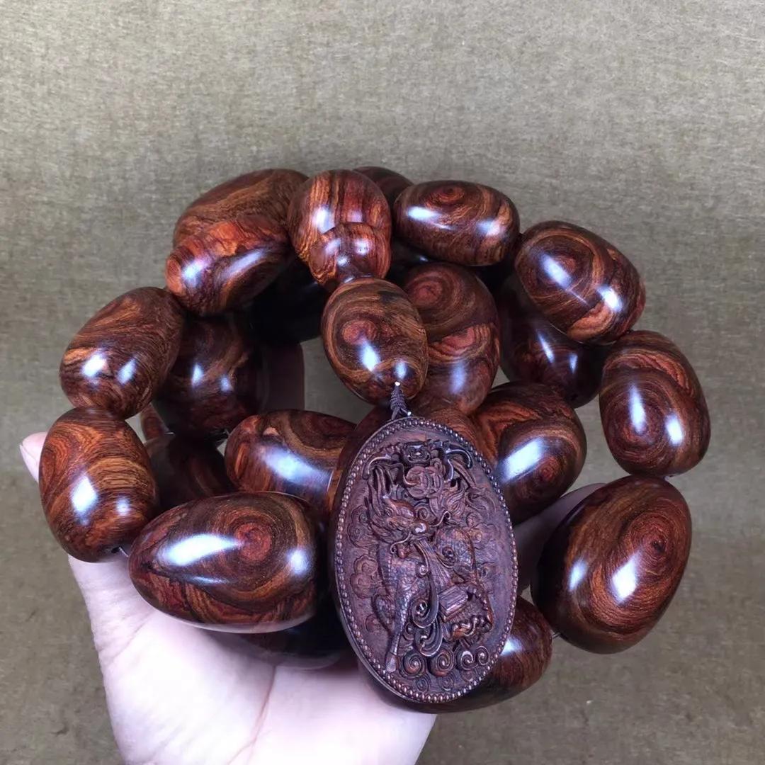 几百块一串的海南黄花梨手串,1.0的108串海南黄花梨手串配饰图片