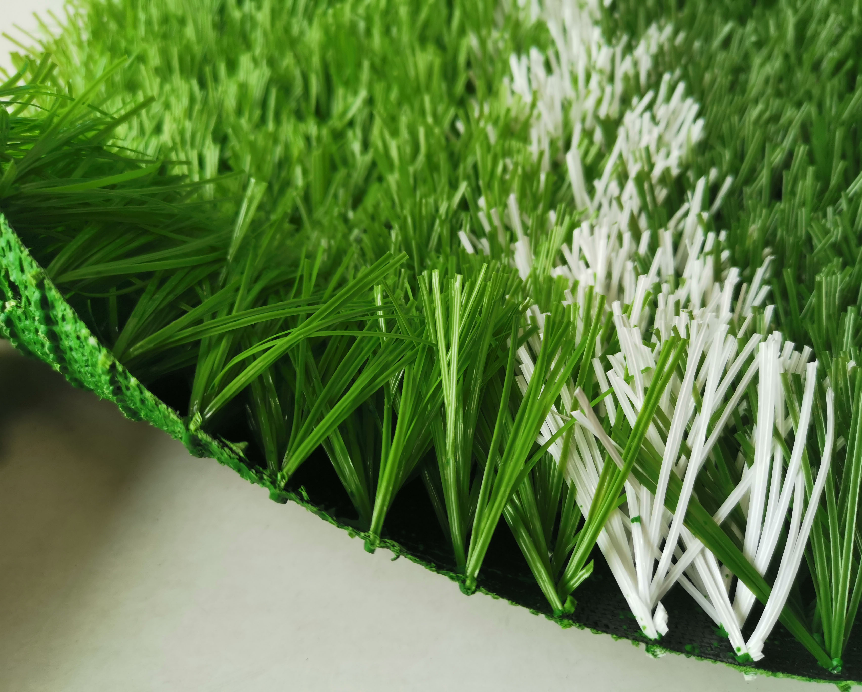 人造草坪报价,人造草坪运动场地每平米价格