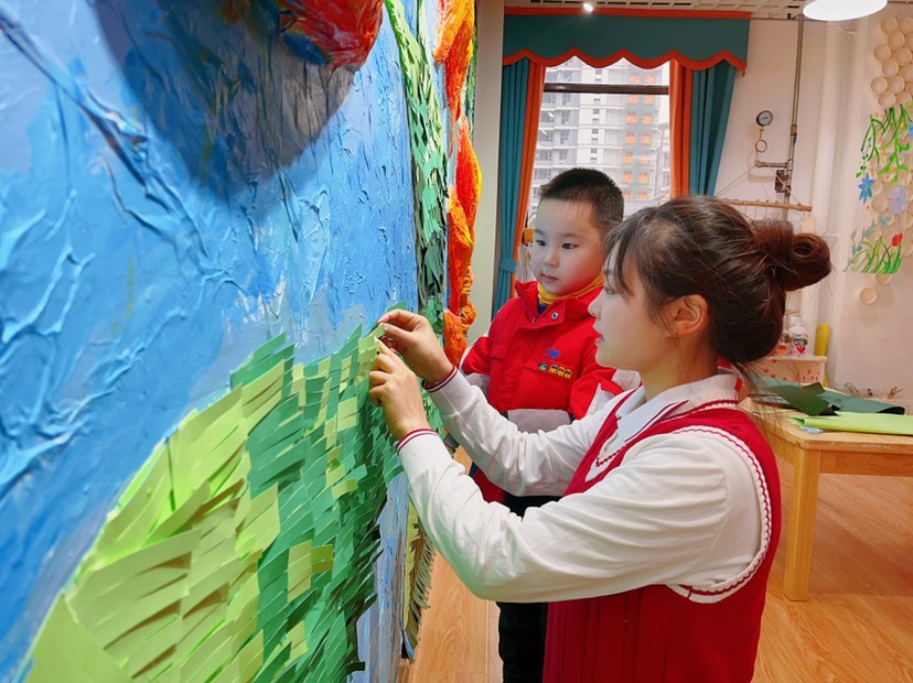 文明典范共建共享|幼儿园的这面向日葵网红墙太惊艳！