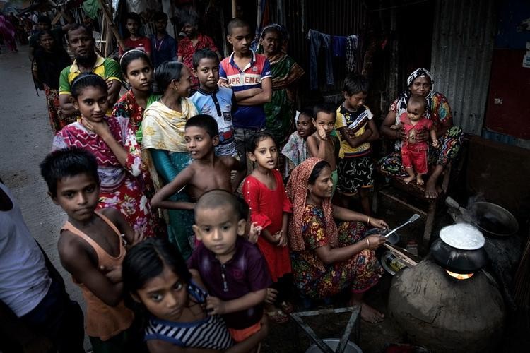 快速发展的特大城市达卡的贫民窟和非贫民窟，社区改善水成本如何