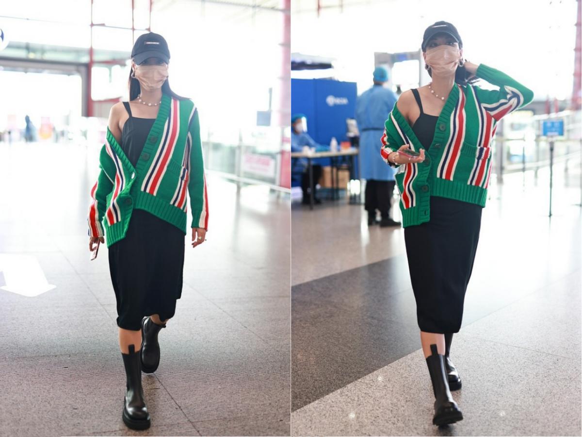 王霏霏黑西装齐刘海,王霏霏机场粉色包包