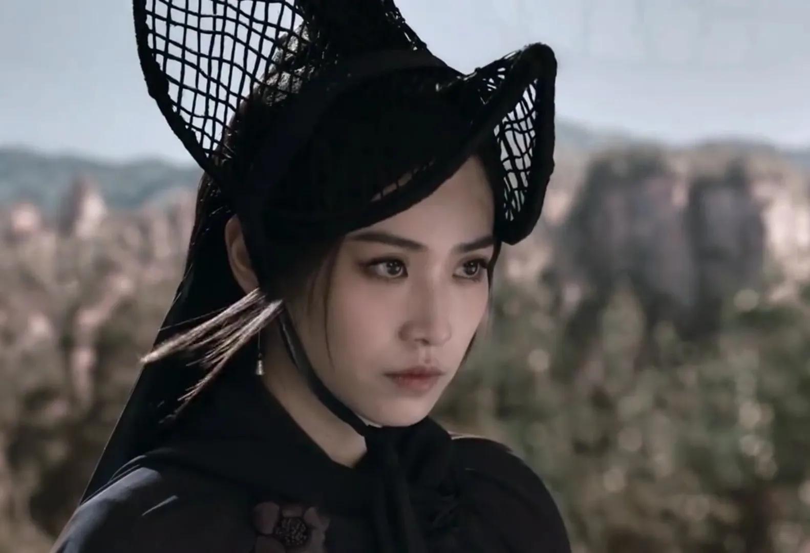 木婉清摘面纱,木婉清面纱被吹落的画面