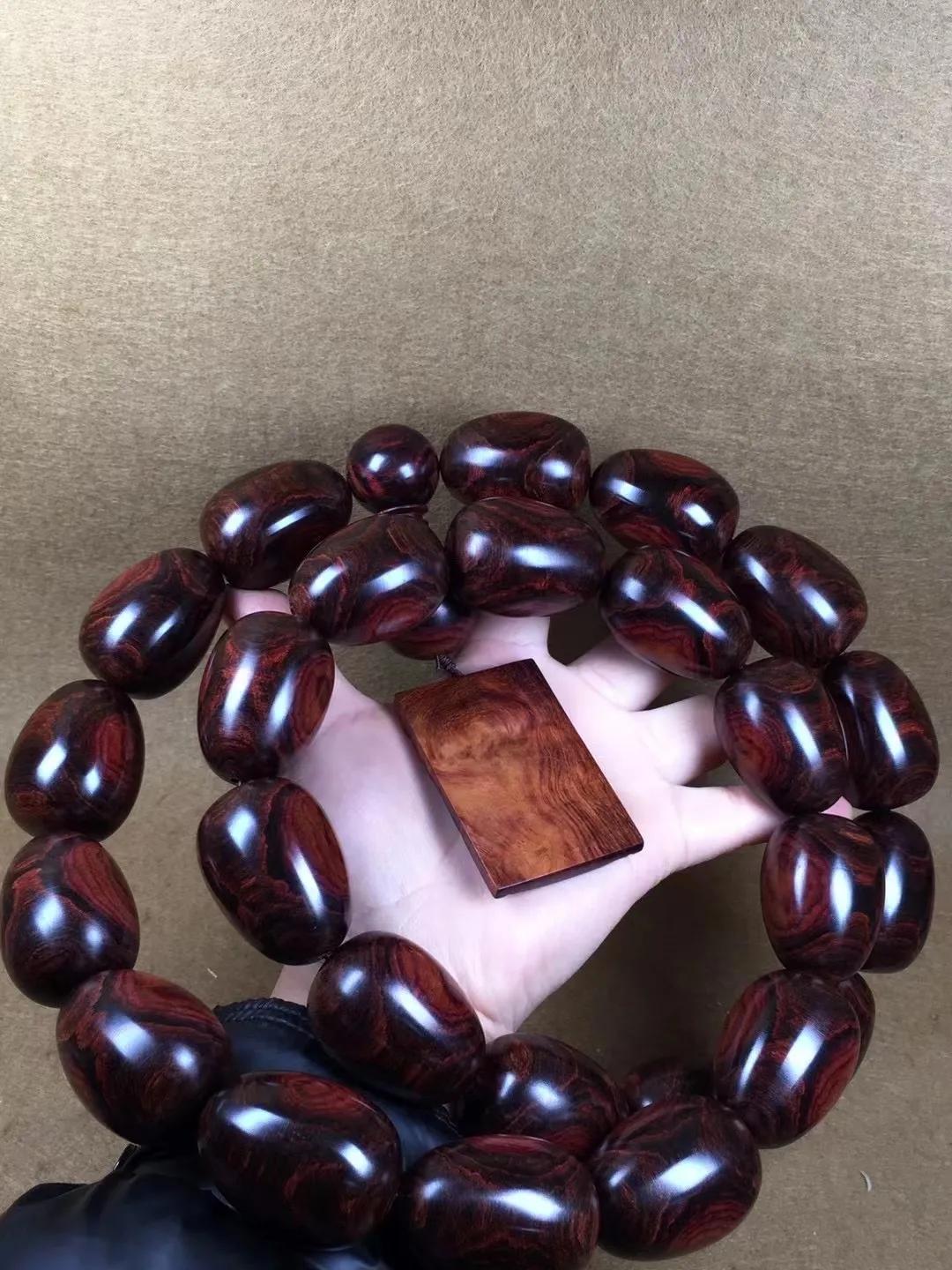 顶级海南黄花梨鬼脸手串,海南黄花梨手串一串多少克