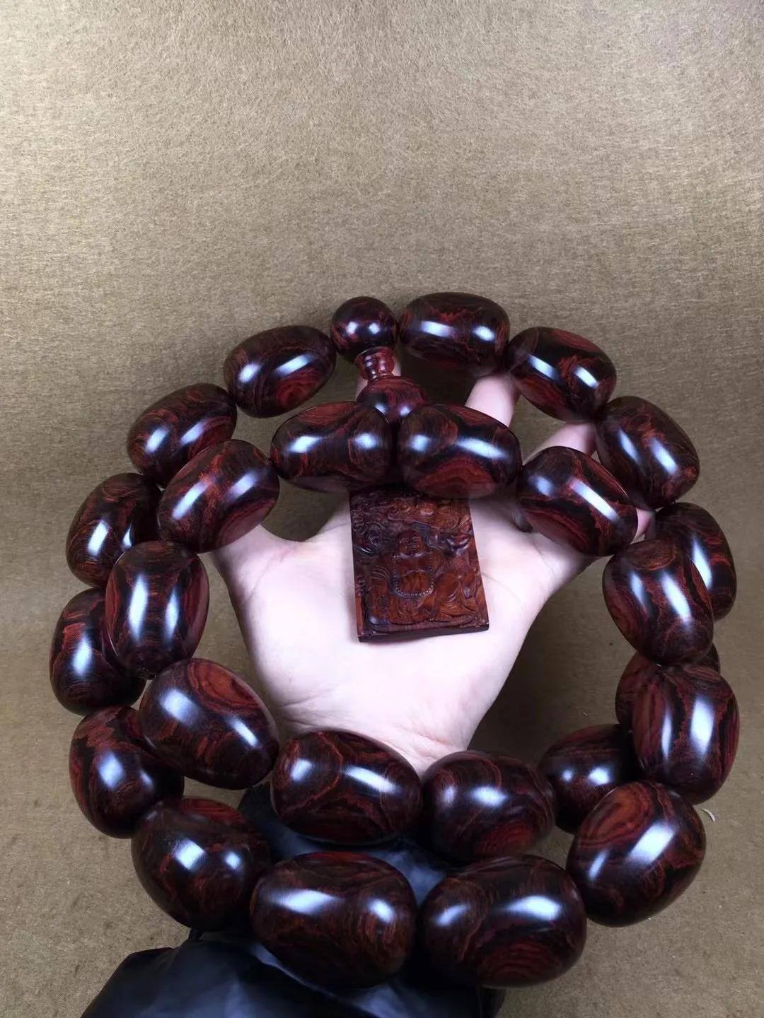 顶级海南黄花梨鬼脸手串,海南黄花梨手串一串多少克