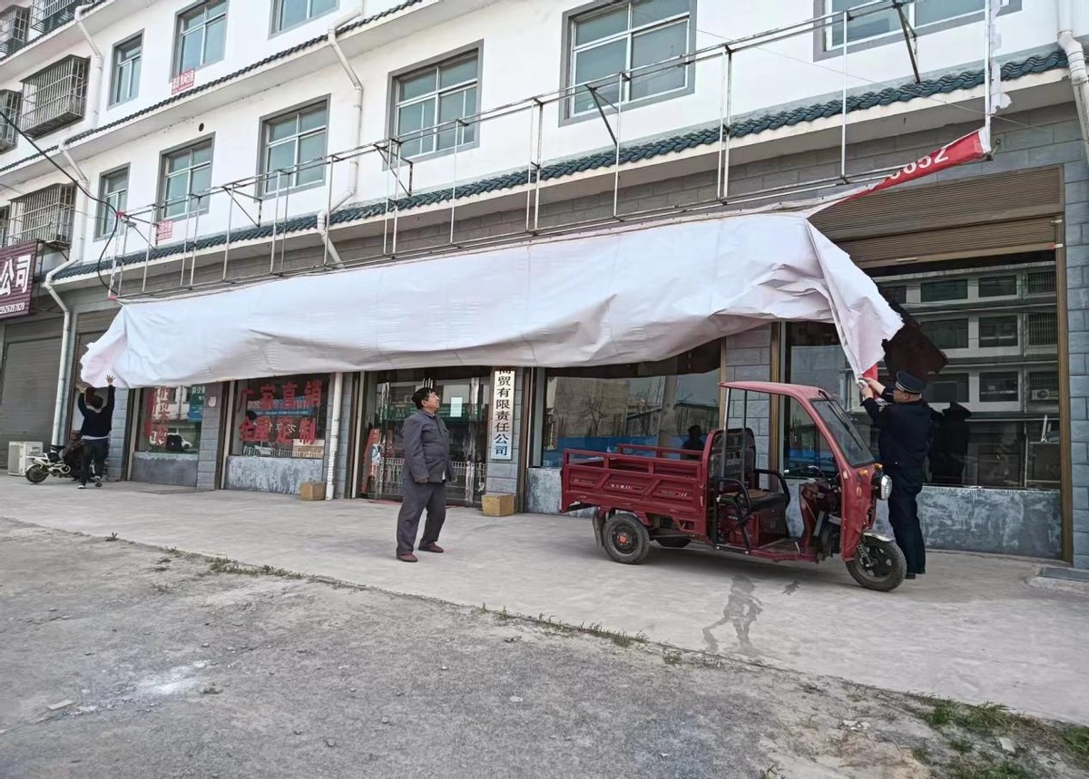 区综合执法局拆除广告,拆除违规广告市容整治