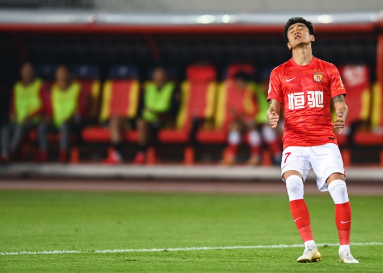 新华社中国足球赢得世界尊重,新华社谈中国足球